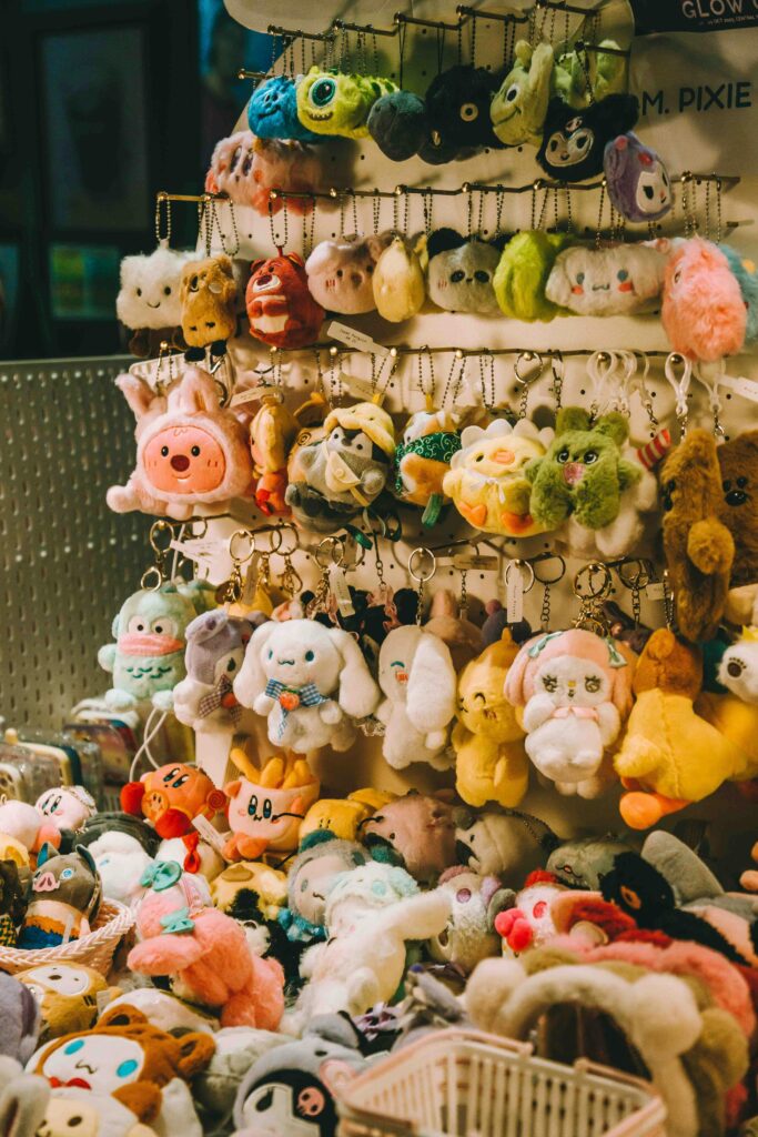 pexels-photo-26870533-26870533 Vibrant array of plush toys and keychains on display in a Kuala Lumpur store.